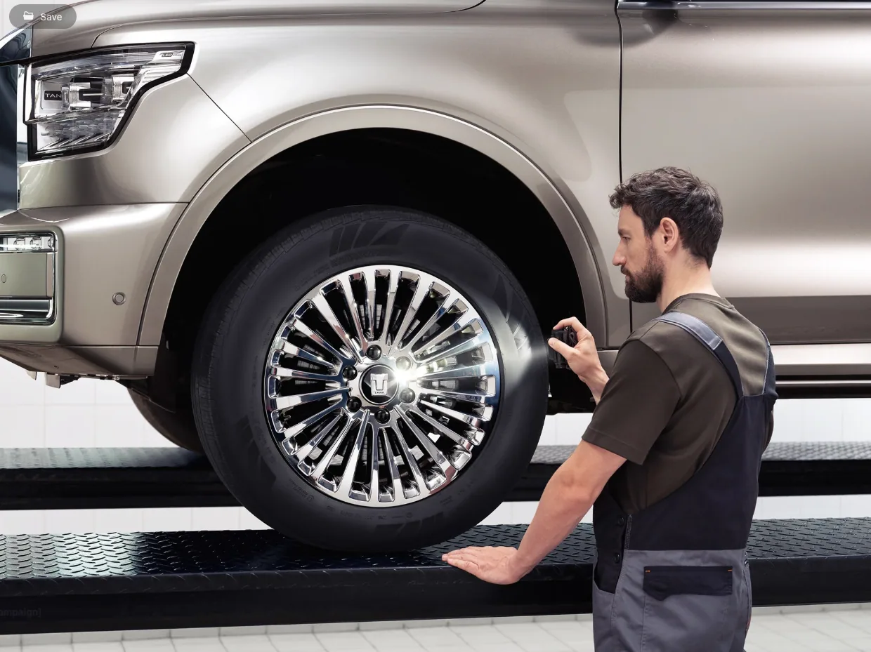 Mechanic inspecting a Tank vehicle in the workshop